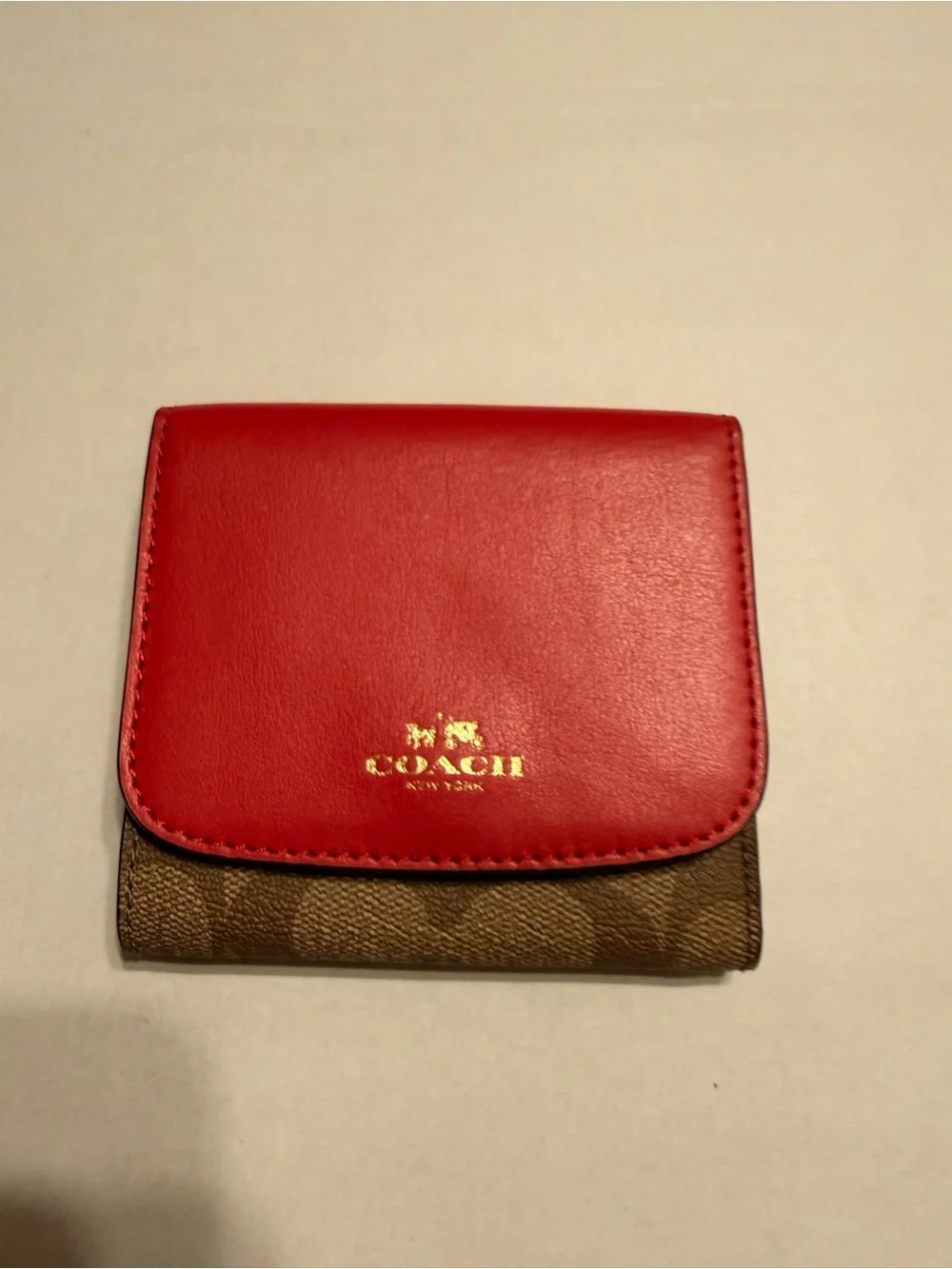 Coach Trifold Wallet in pink and Brown